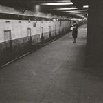 Woman waiting on a subway platform, 1946